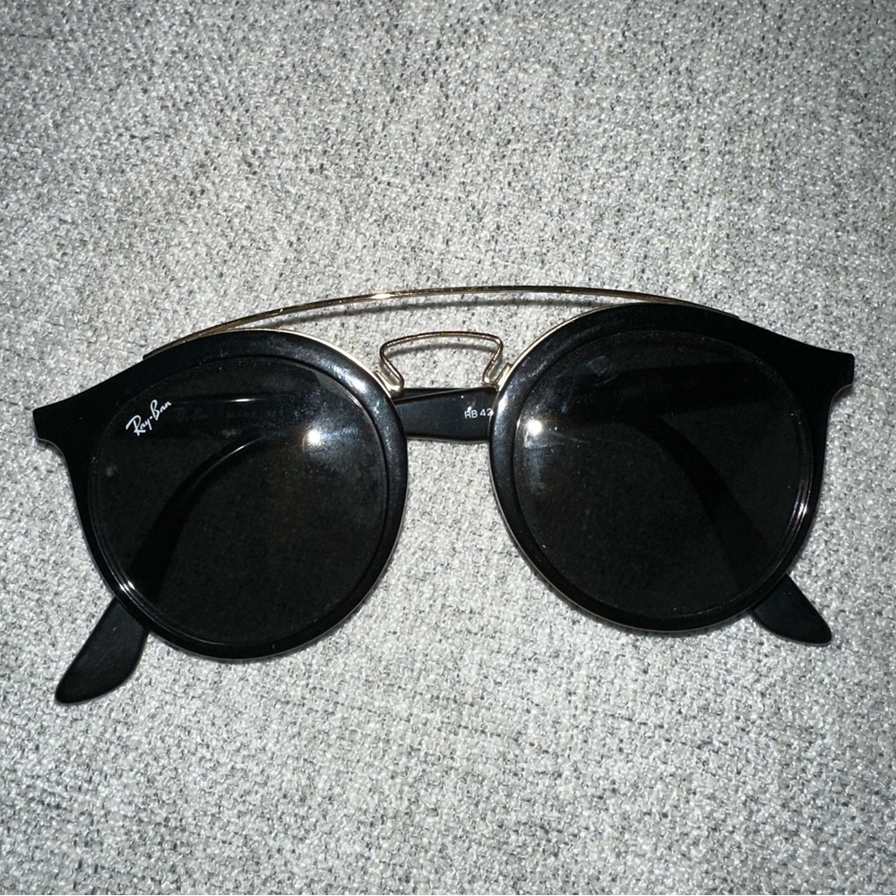 Ray Bans Black sunglasses with gold bridge 
RB4256 GATSBY